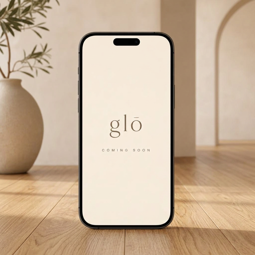 The glō mobile app shown on a phone with a coming soon screen